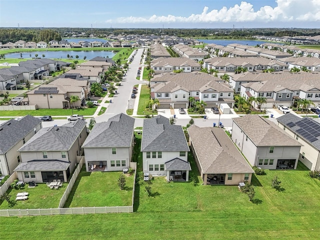 drone / aerial view with a water view