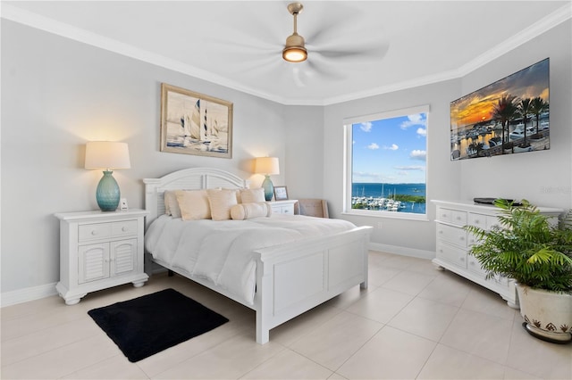 bedroom with crown molding, light tile patterned floors, and ceiling fan