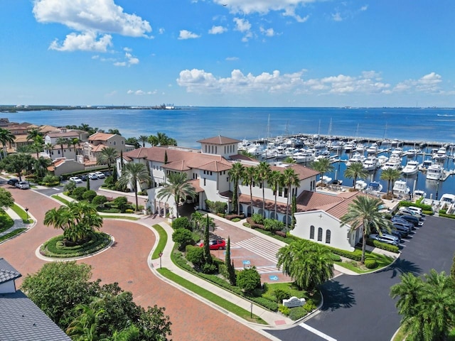 birds eye view of property featuring a water view