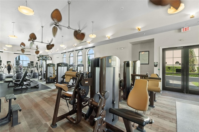 gym featuring french doors