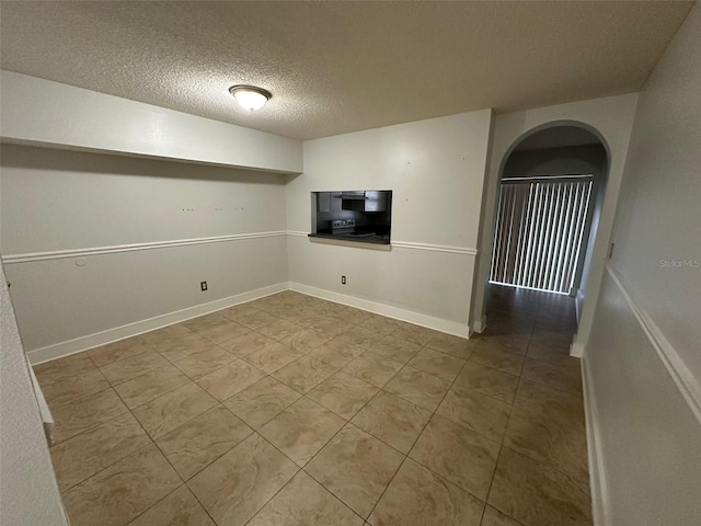 interior space with a textured ceiling