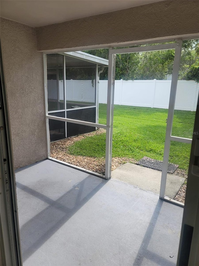 view of unfurnished sunroom