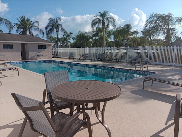 view of pool featuring a patio