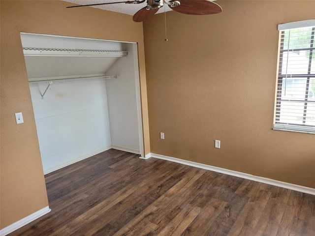 10908 Claymont Dr, New Port Richey, FL 34654 - unfurnished bedroom featuring wood finished floors, baseboards, a closet, and ceiling fan