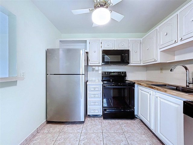 11920 Boynton Ln Unit 11920, New Port Richey, FL 34654 - kitchen featuring decorative backsplash, a ceiling fan, a sink, and black appliances