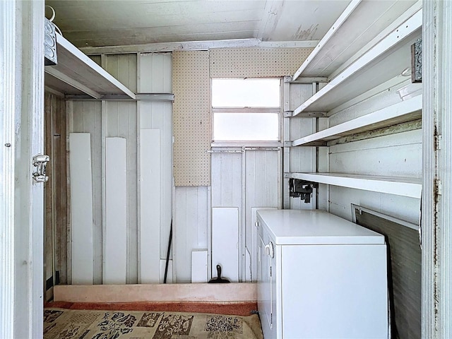 11920 Boynton Ln Unit 11920, New Port Richey, FL 34654 - laundry room featuring washer / dryer and laundry area
