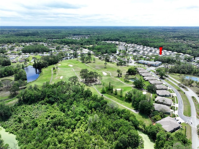 11920 Boynton Ln Unit 11920, New Port Richey, FL 34654 - drone / aerial view featuring a forest view, a residential view, a water view, and golf course view