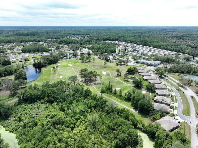 11920 Boynton Ln Unit 11920, New Port Richey, FL 34654 - bird's eye view with view of golf course, a water view, a residential view, and a wooded view