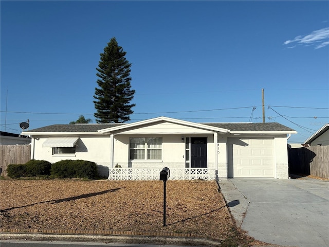 ranch-style house featuring a garage