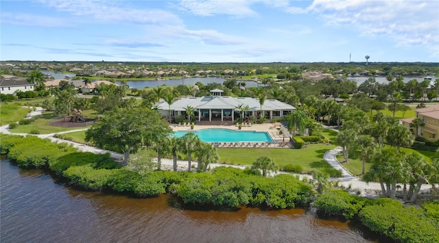 birds eye view of property featuring a water view