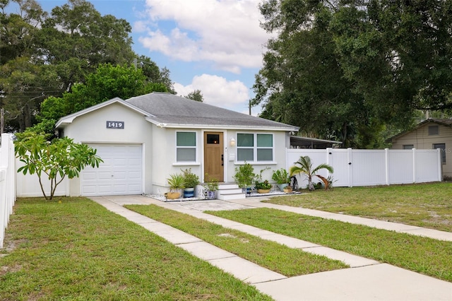 1419 30th Ave N, Saint Petersburg, FL 33704 - ranch-style home with a garage, a gate, stucco siding, a shingled roof, and driveway