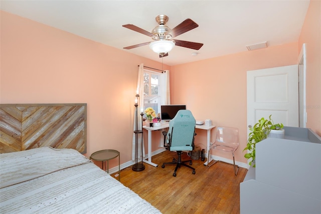 bedroom featuring light hardwood / wood-style flooring and ceiling fan