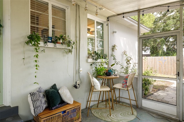 sunroom / solarium featuring a wealth of natural light