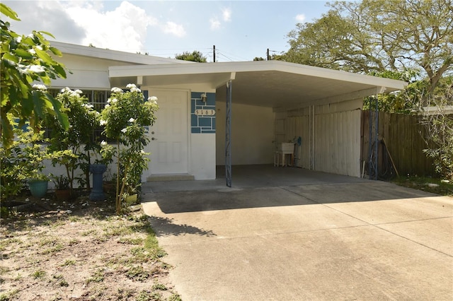 view of front of house featuring a carport