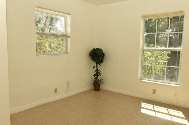 view of tiled spare room