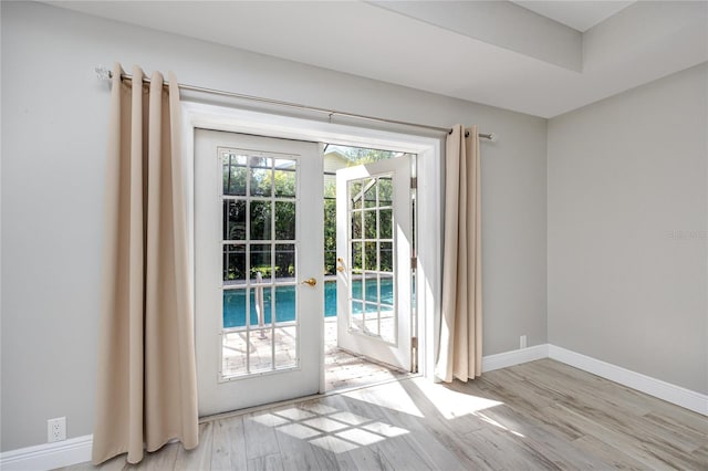 doorway featuring light hardwood / wood-style floors