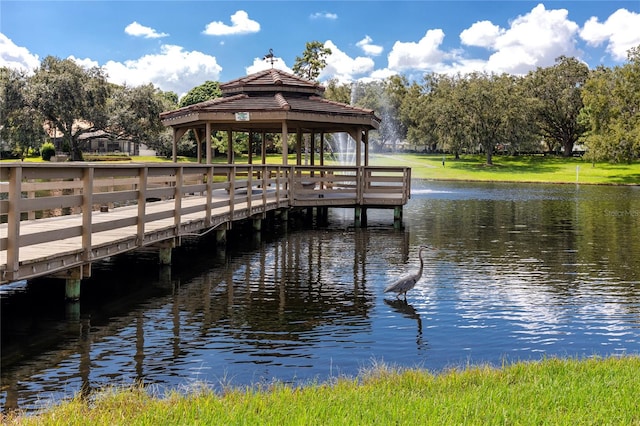 dock area featuring a gazebo and a water view