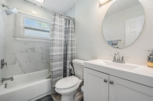 full bathroom with shower / tub combo with curtain, vanity, and toilet