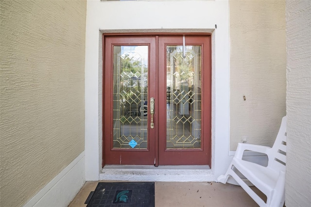 view of exterior entry with french doors