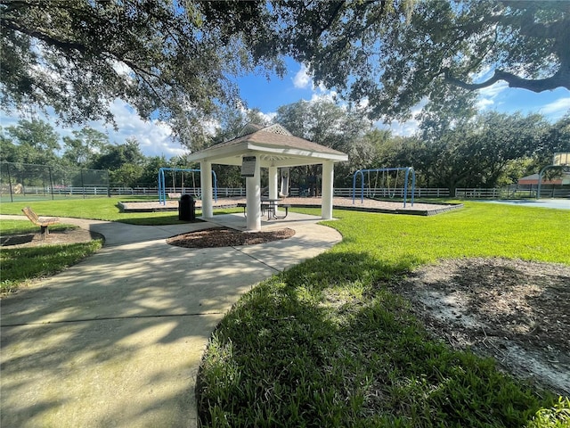 view of community with a lawn and a gazebo