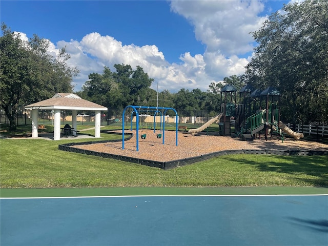 view of play area with a gazebo and a lawn