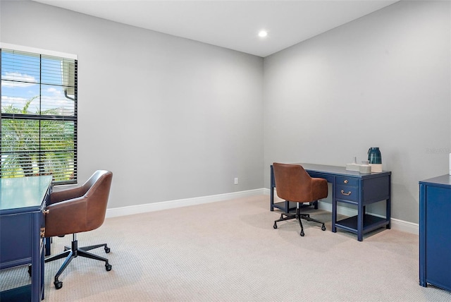 home office featuring light colored carpet