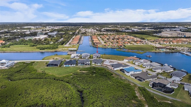 drone / aerial view with a water view