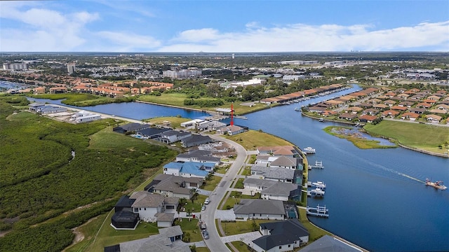 drone / aerial view with a water view