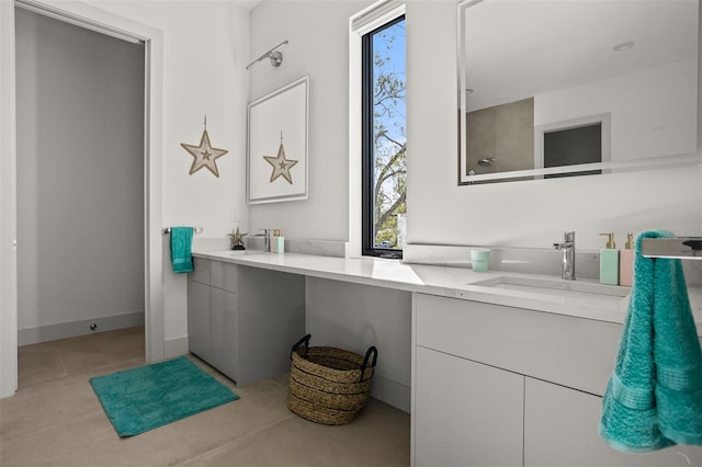 bathroom featuring vanity and tile patterned flooring