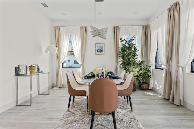 dining area featuring light hardwood / wood-style flooring