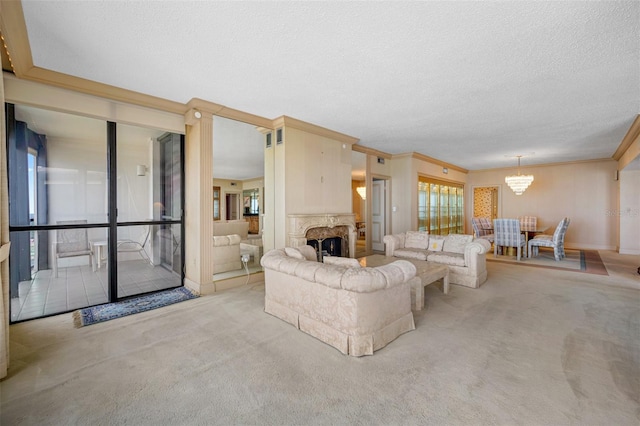 living room featuring ornamental molding, a textured ceiling, light colored carpet, and an inviting chandelier