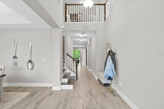 entrance foyer with light hardwood / wood-style flooring