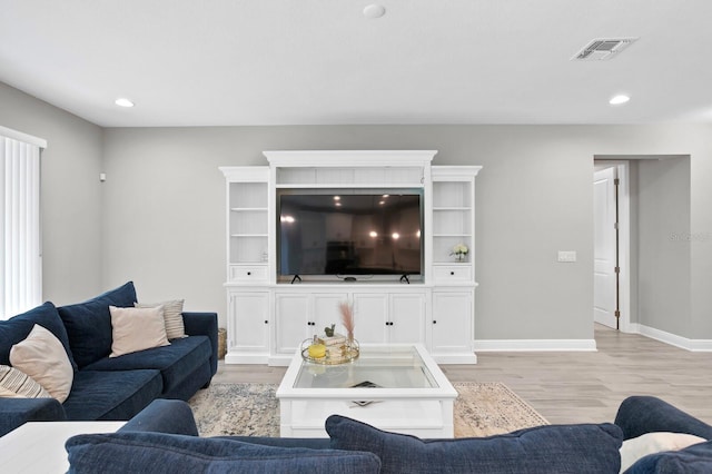 living room featuring light wood-type flooring