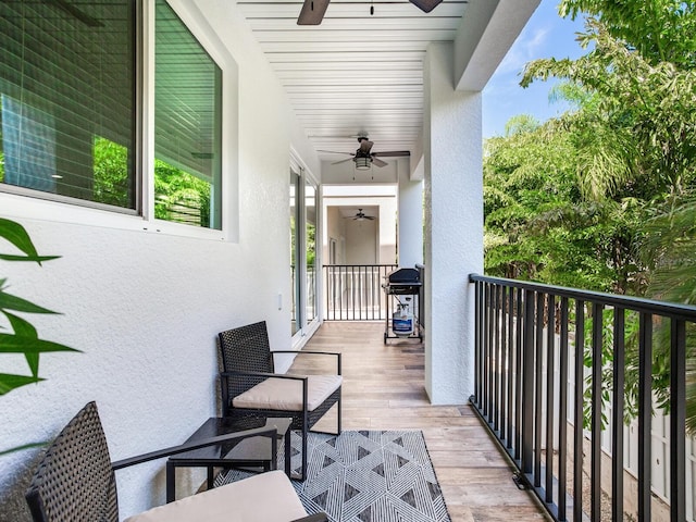 balcony featuring ceiling fan