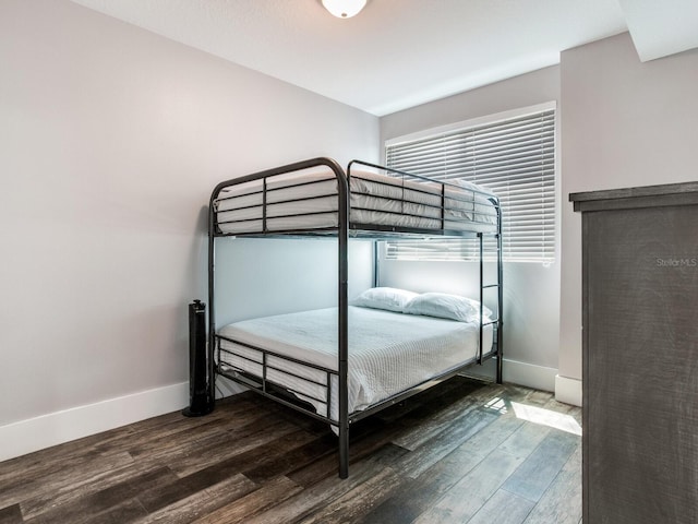 unfurnished bedroom featuring hardwood / wood-style floors