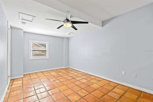 unfurnished room with ceiling fan and light tile patterned flooring