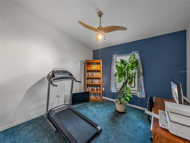 exercise room featuring carpet, vaulted ceiling, and ceiling fan