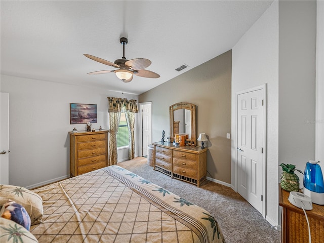 bedroom featuring ceiling fan, lofted ceiling, and carpet flooring