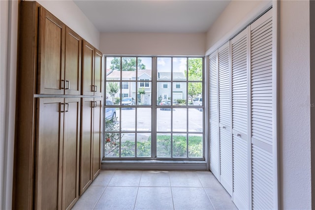 interior space featuring light tile patterned floors