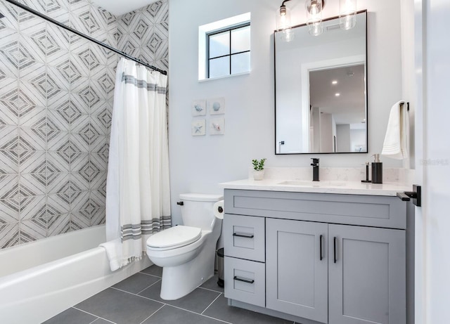 full bathroom with tile walls, shower / bath combo, tile patterned floors, vanity, and toilet