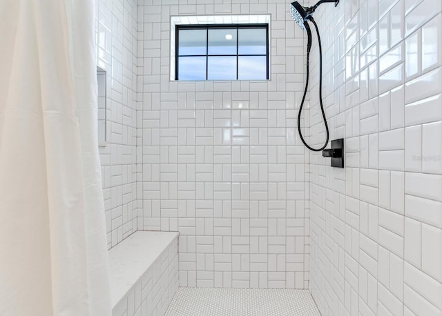 bathroom featuring a shower with curtain