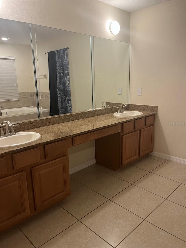 bathroom with vanity and tile patterned floors