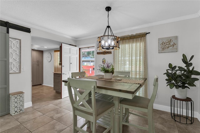 dining room featuring a barn door, ornamental molding, light tile patterned floors, and an inviting chandelier