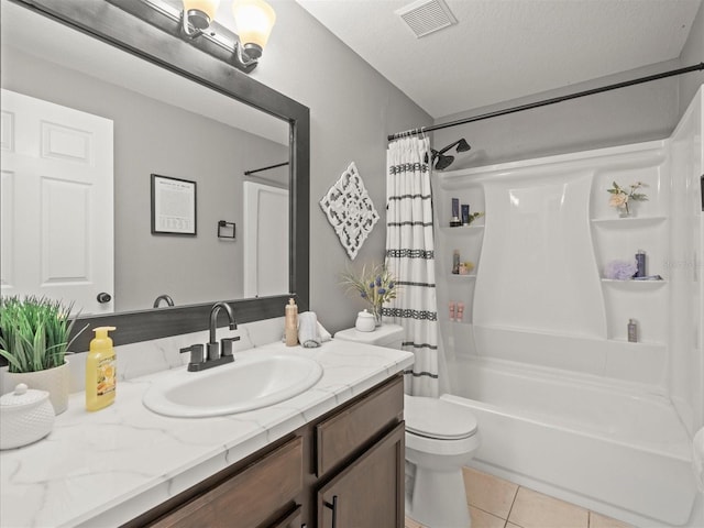 full bathroom featuring shower / bath combo, tile patterned flooring, a textured ceiling, toilet, and vanity