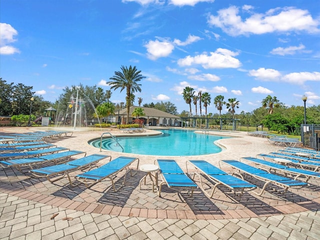 view of pool featuring a patio