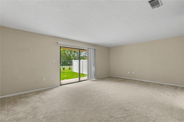 unfurnished room with carpet floors