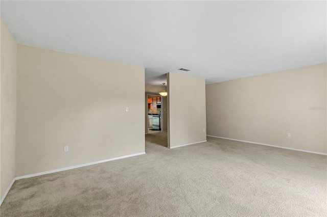 507 NW 39th Rd Unit 318, Gainesville, FL 32607 - carpeted empty room with baseboards
