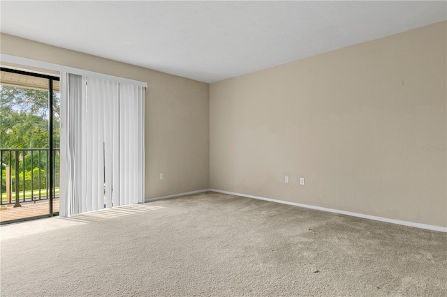 507 NW 39th Rd Unit 318, Gainesville, FL 32607 - unfurnished room featuring carpet floors and baseboards