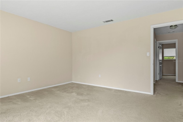 507 NW 39th Rd Unit 318, Gainesville, FL 32607 - spare room with carpet flooring and baseboards