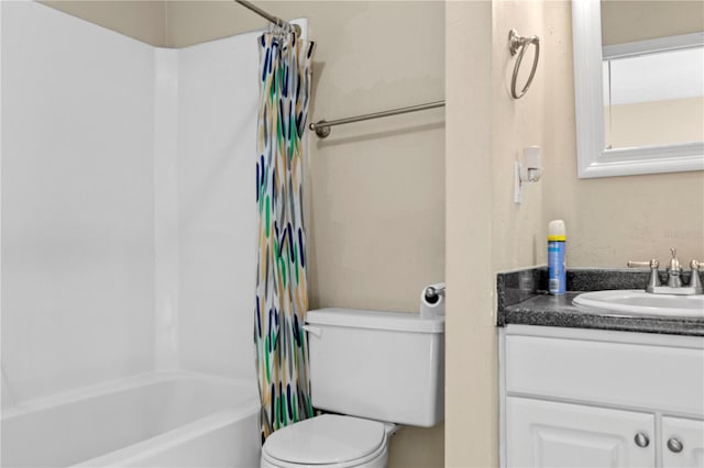 full bathroom with vanity, toilet, and shower / bath combo with shower curtain